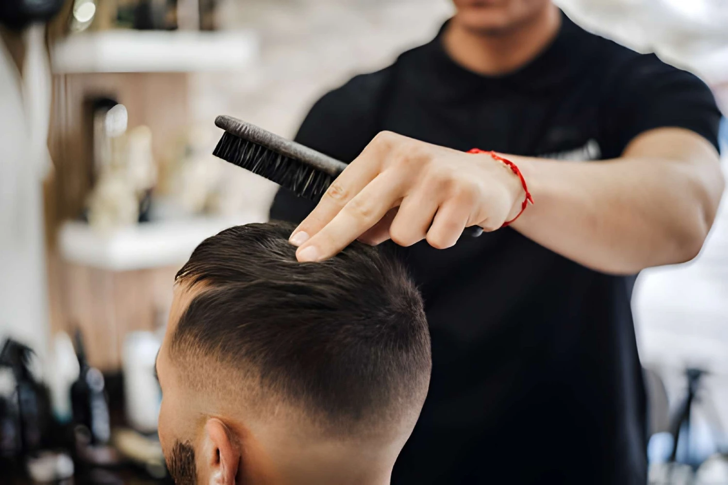 Barber Giving A Haircut in His Shop